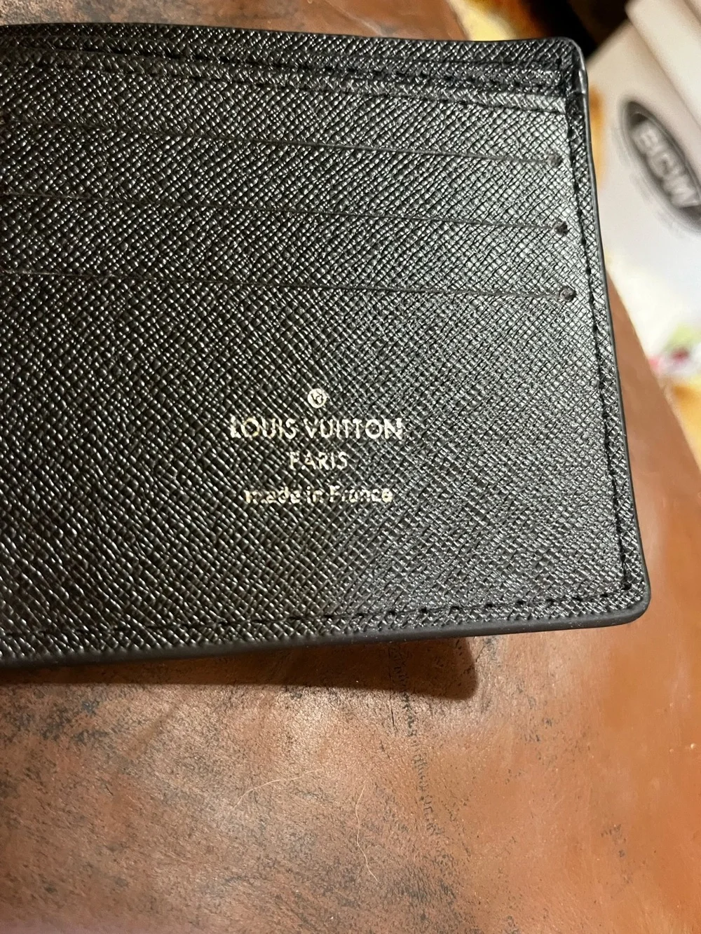 ⚫️ Louis. Vuitton. Embossed Letter Monogram Black Bi-Fold Wallet